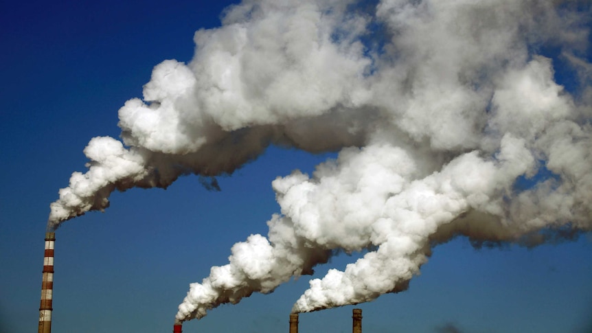 Smoke billows from the chimneys of a heating plant in the Chinese city of Jilin.