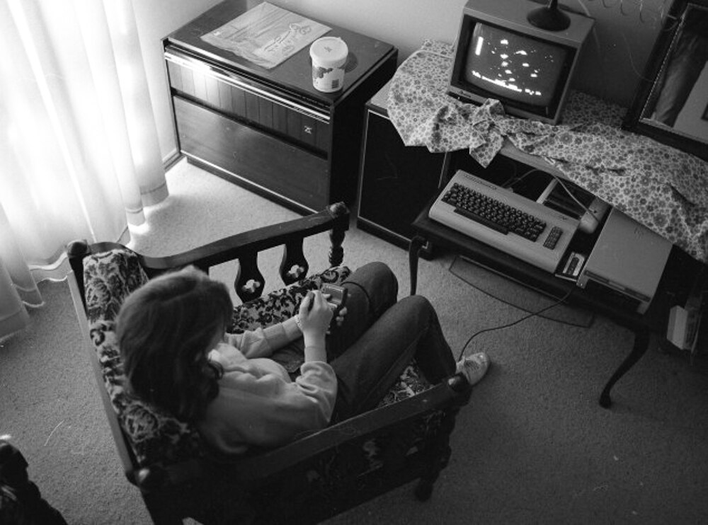 Katie Scott playing a Commodore 64 she received as a Christmas present in 1985.