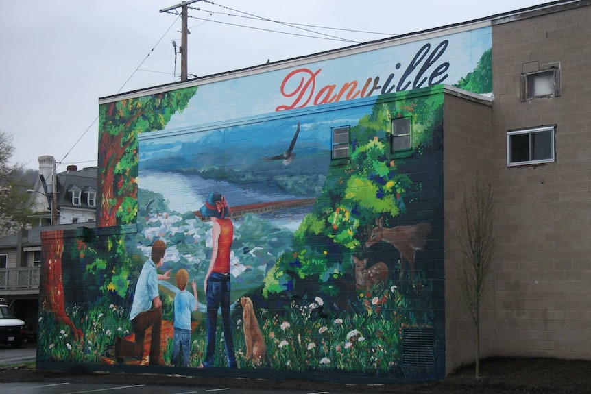 A mural on the side of a building in the town of Danville