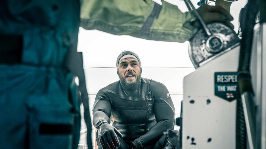 Ross Edgley, who swam the entire distance around Great Britain, pauses for a moment's rest before his next dip in to the ocean.