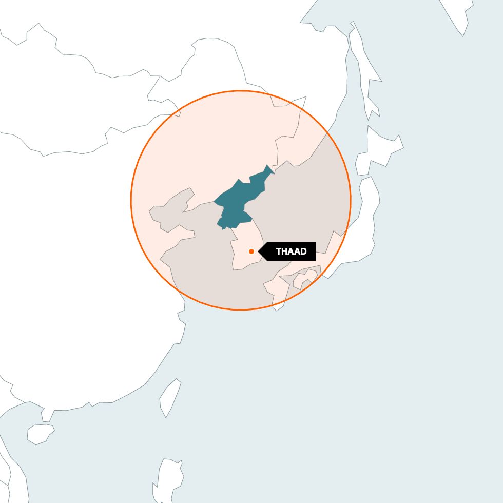 A red circle around blue North Korea shows the range of its short-range ballistic missiles. THAAD is inside the circle.