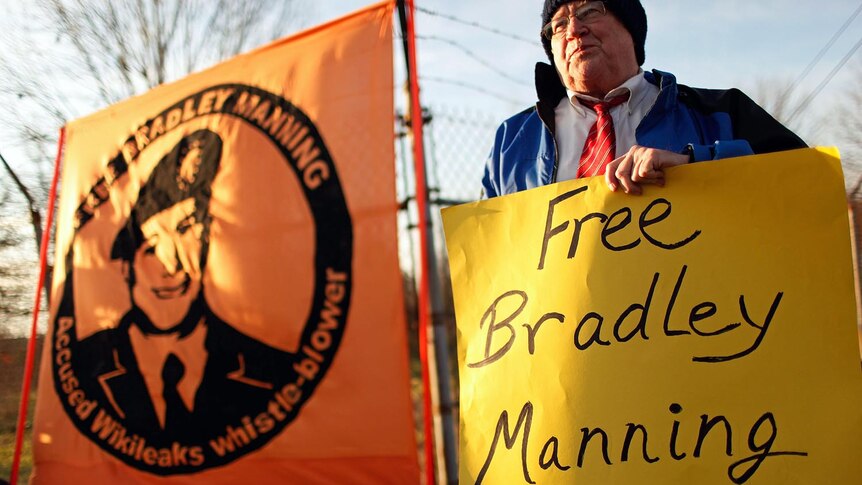 Supporters of Bradley Manning hold a vigil outside the gates of Fort Meade.