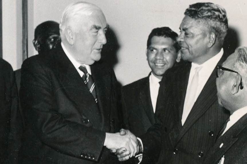 Uncle Joe McGinness shakes hand with Robert Menzies.