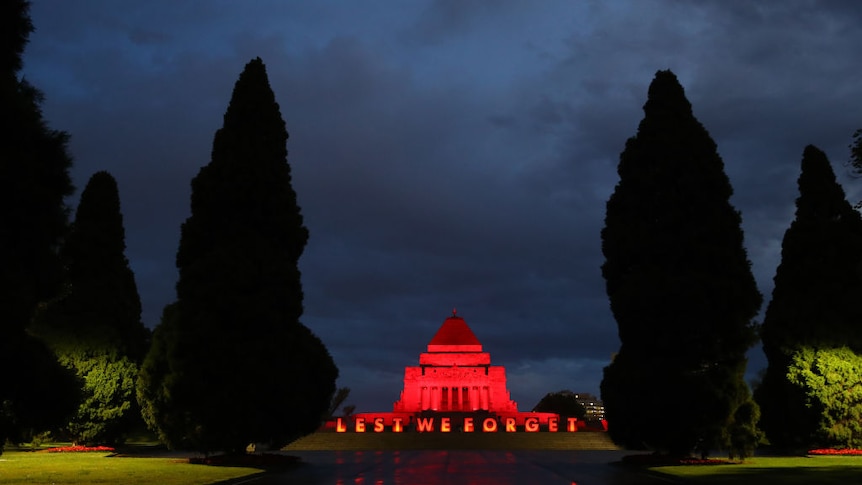 The Shrine of Remembrance lit up in red to mark Remembrance Day on November 11, 2020 in Melbourne, Australia