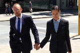 Robert Cunningham and wife Catherine Atoms outside the Perth District Court. The couple say they were tasered and arrested by police after stopping to assist strangers who had fallen in Fremantle. Monday 16, 2015.