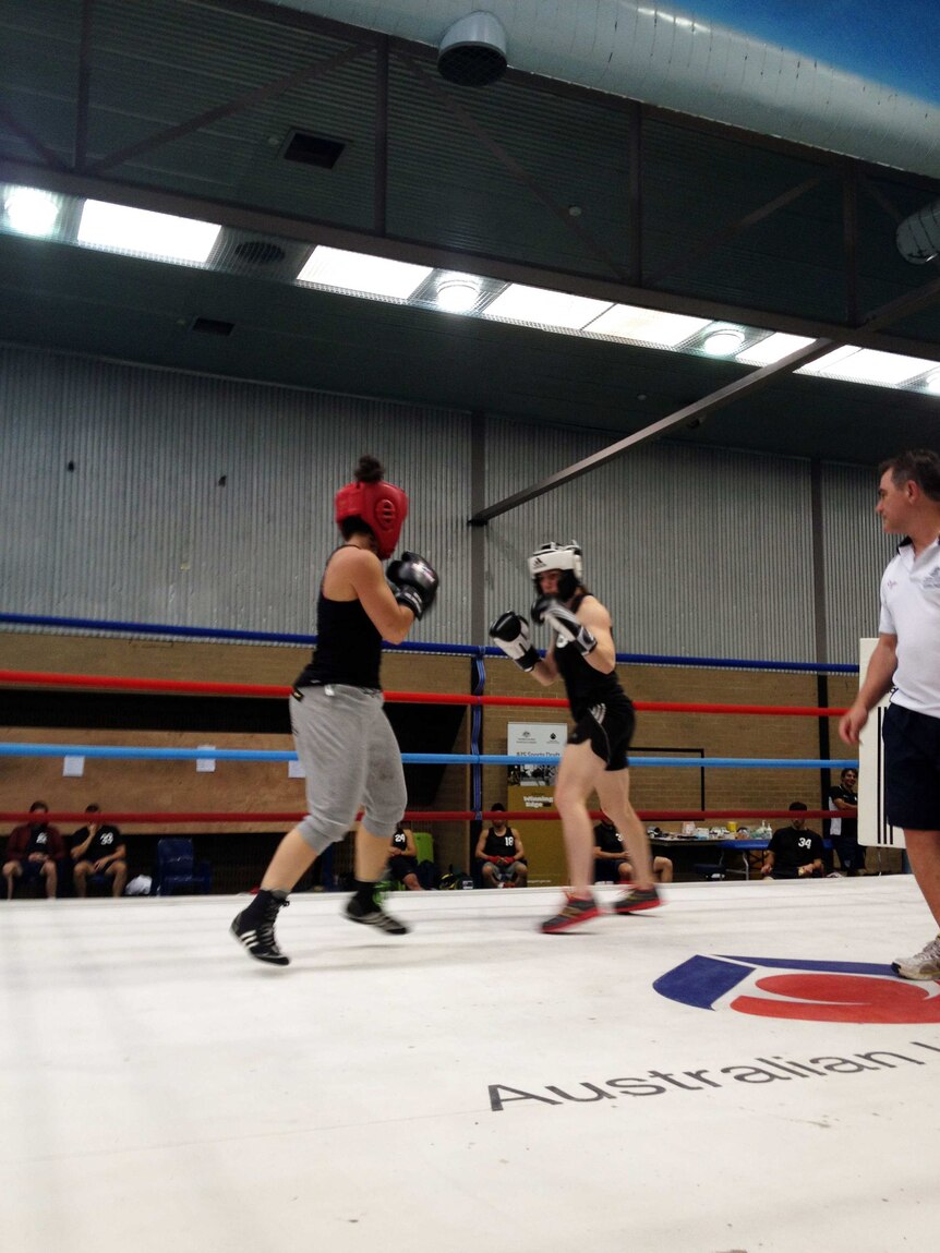 Sally Bromley (right) boxing against Bianca Elmir (left) at the Australian Institute of Sport.
