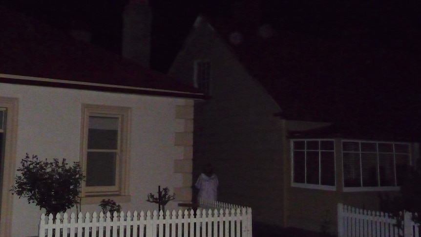 A female ghost standing in the darkness at Arthur Circus in Battery Point, Hobart