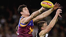 Jonathan Brown marks against Collingwood.