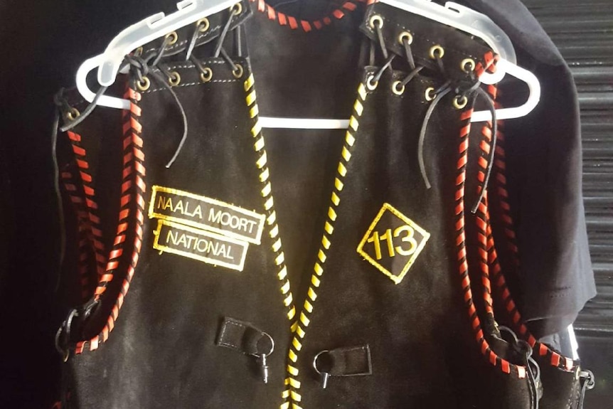 Picture of a leather, sleeveless jacket worn by the Naala Moort group.