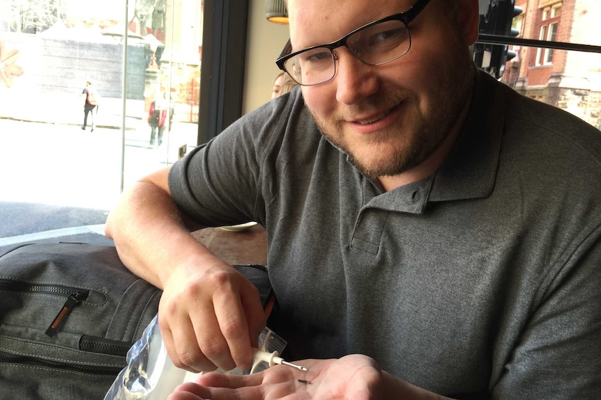 Amal Graafstra, biohacker and founder of Dangerous Things at a coffee shop in Sydney