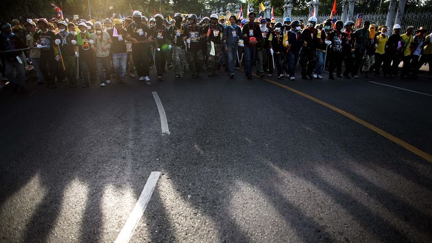 Anti-government protesters gather outside the Parliament House in Bangkok