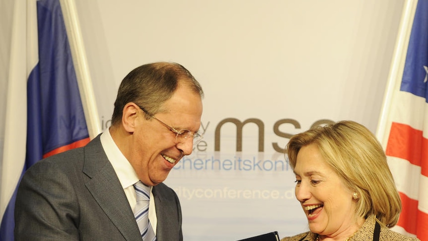 Hillary Clinton and Sergei Lavrov exchange documents formally bringing into force the landmark  pact