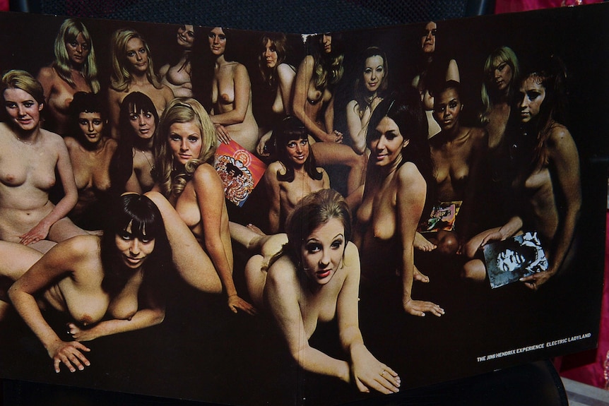 Record cover featuring many naked women crowded together