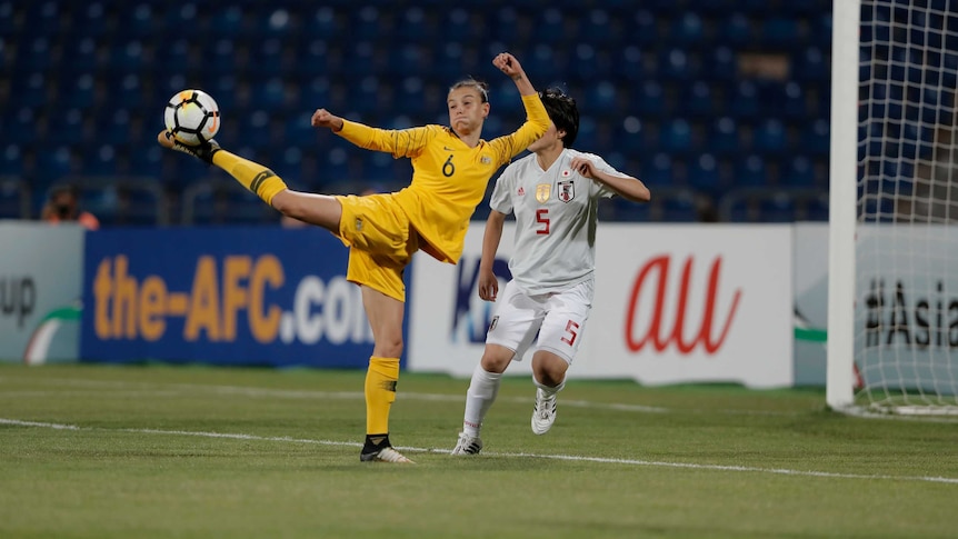 Australia's Chloe Logarzo controls the ball against Japan