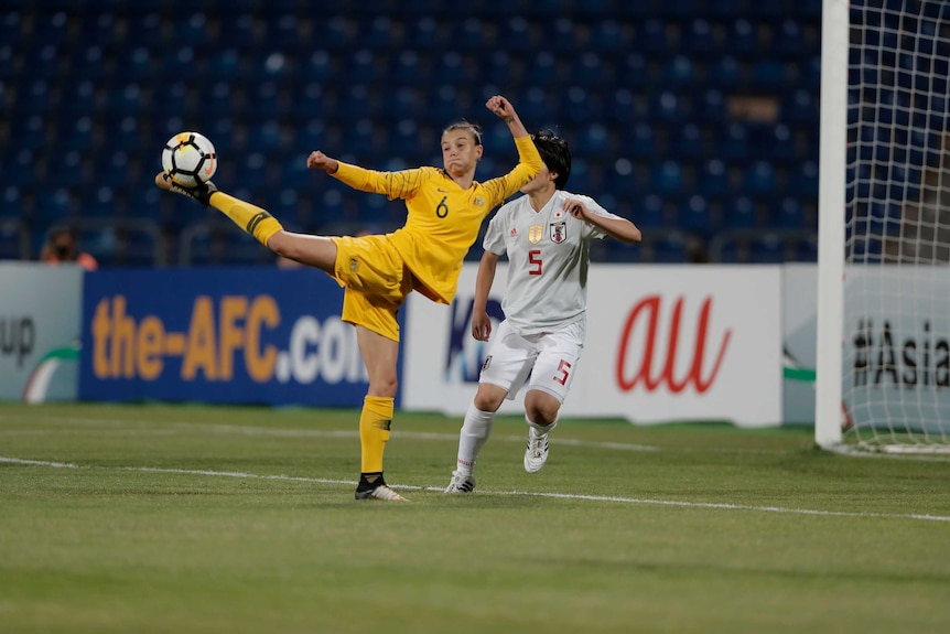 Australia's Chloe Logarzo controls the ball against Japan