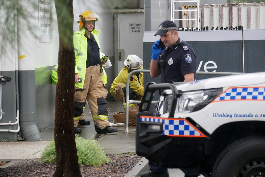 Police and emergency services at scene where a woman's body was found in a charity bin at Burleigh on Queensland's Gold Coast.