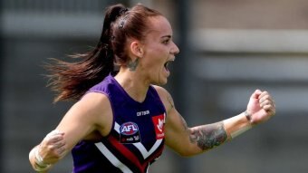 Fremantle player Gemma Houghton celebrates.