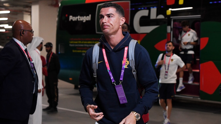 Portugal's Cristiano Ronaldo walks away from the team before their Qatar World Cup match against Switzerland.