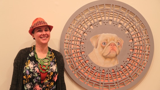 Laura Kennedy with her art in TMAG