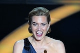 Kate Winslet clutches her Oscar after winning the best actress category at the 81st Academy Awards.