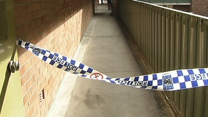 Police set up a crime scene at Sunday's Redfern killing.