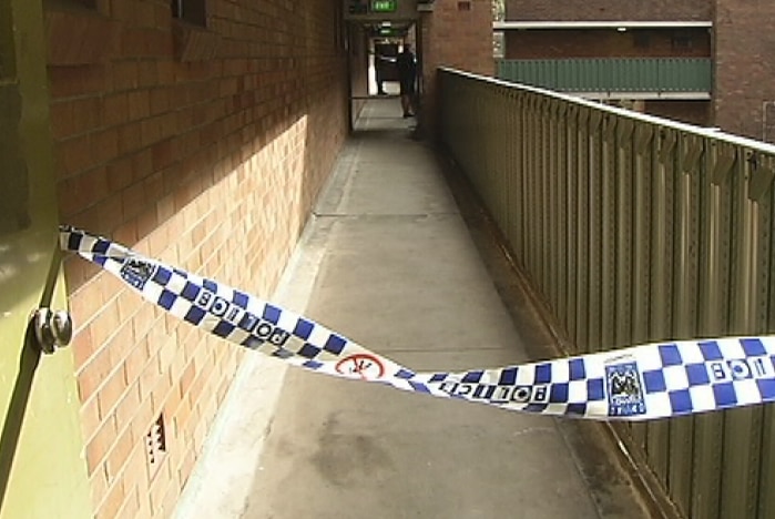 Police set up a crime scene at Sunday's Redfern killing.