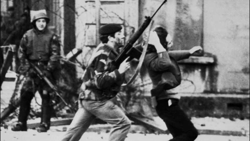 A British soldier drags a Catholic protester during the Bloody Sunday killings.