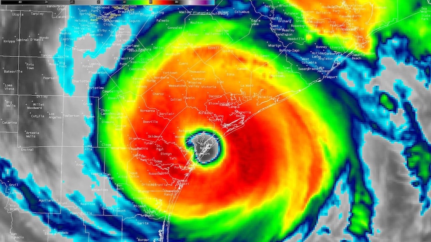 A coloured satellite image of Hurricane Harvey.