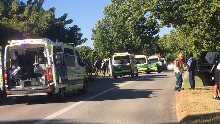 A row of ambulances in Canning Vale, where pedestrians are believed to have been hit.