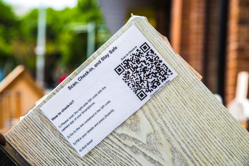 NSW's new mandatory QR codes cause confusion after one day. Here's