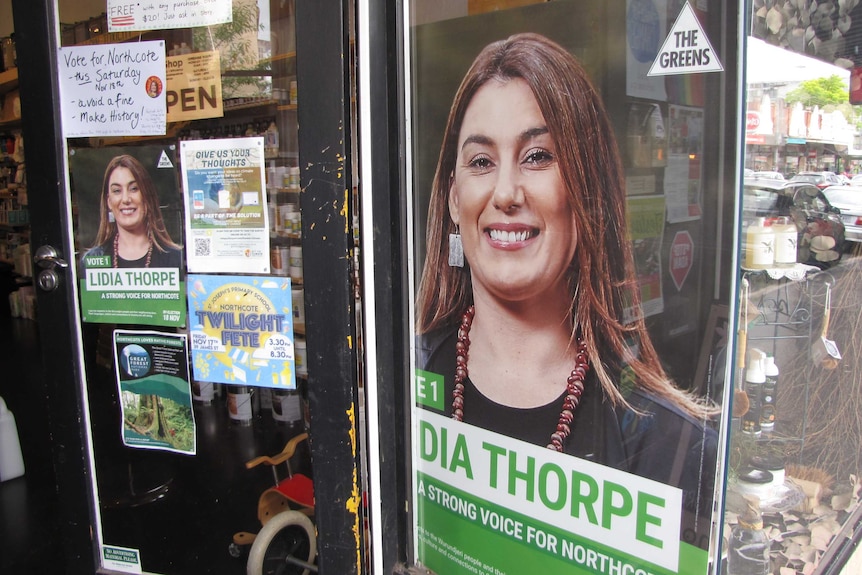 A campaign poster for Greens candidate Lidia Thorpe in a Northcote shop window.