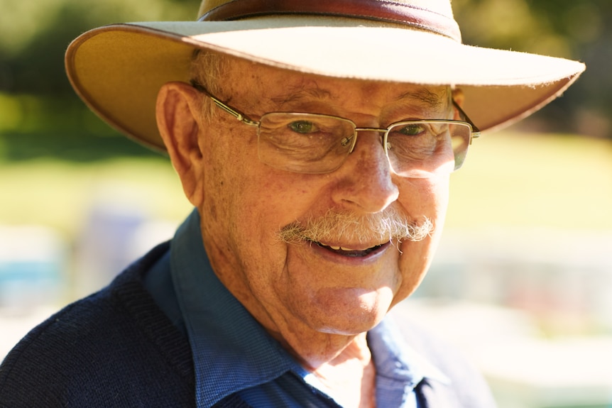 old man in farm hat