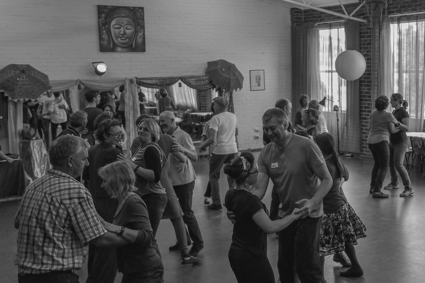 A photo of a crowd of people dancing at the Lindy Hop event in Albany