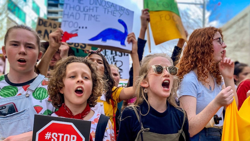Students march during the climate strike in Canberra