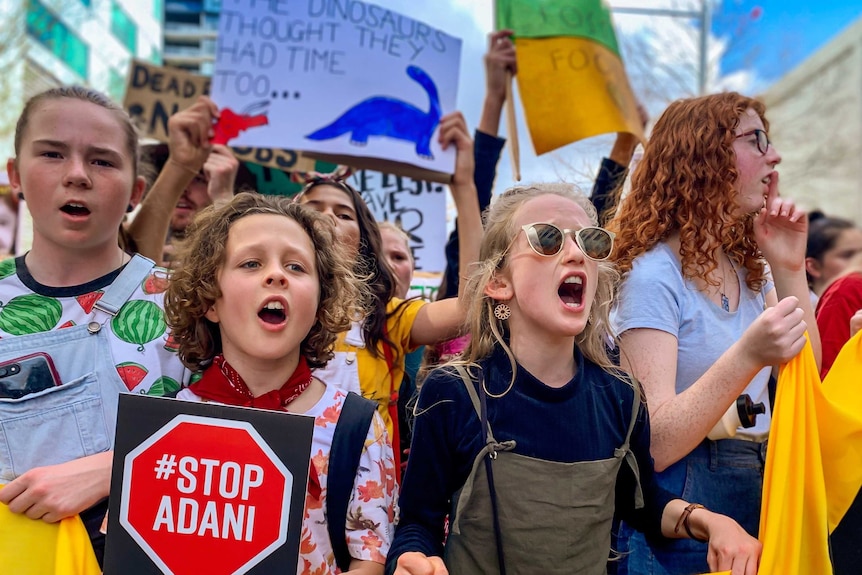 Students march during the climate strike in Canberra