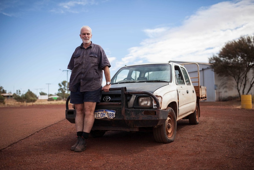 Damien McClean leans against his ute in Warburton, WA.