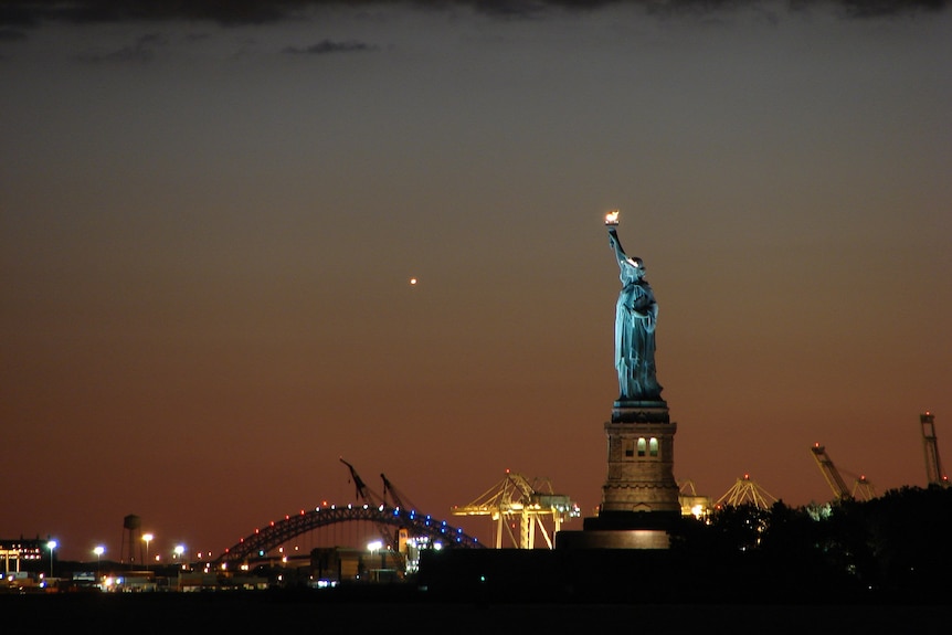 The Statue of Liberty at dusk.