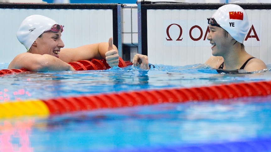 China's Ye Shiwen (R) is congratulated by silver-medallist Alicia Coutts.