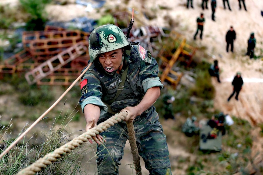 A Chinese paramilitary policeman takes part in a military training session in Xinzhou.