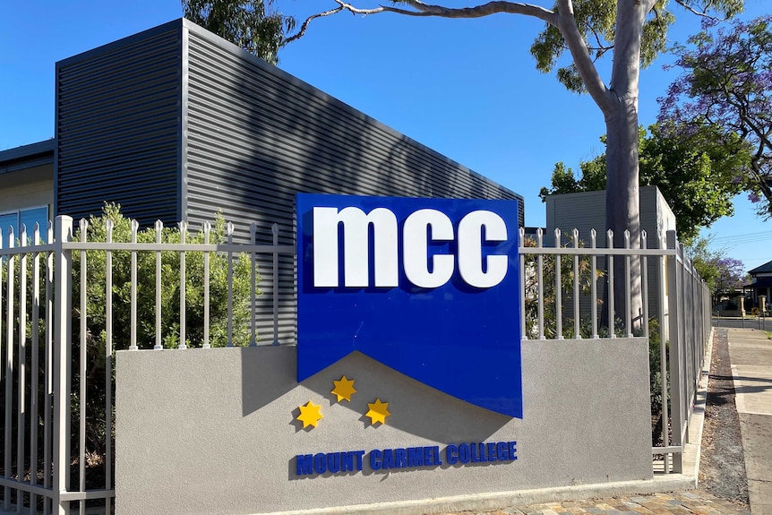 A building with a sign saying MCC out the front