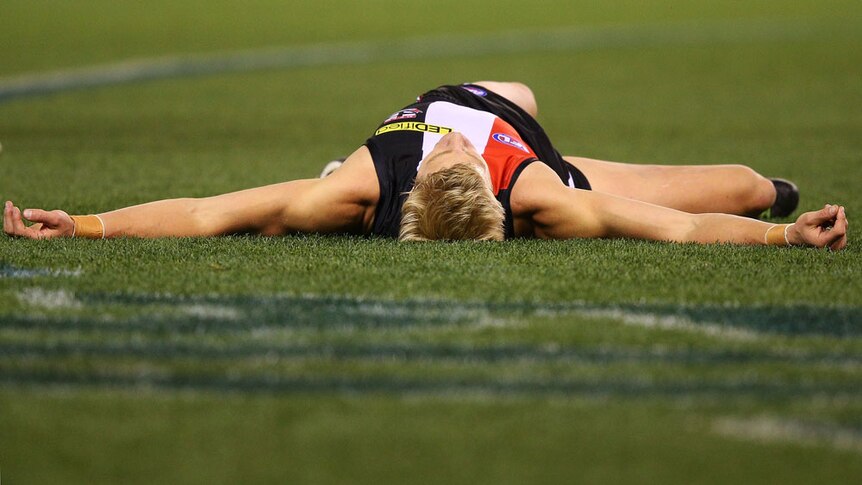 Nick Riewoldt from St Kilda after a contest in a match against the Western Bulldogs in Round 9, 2013.