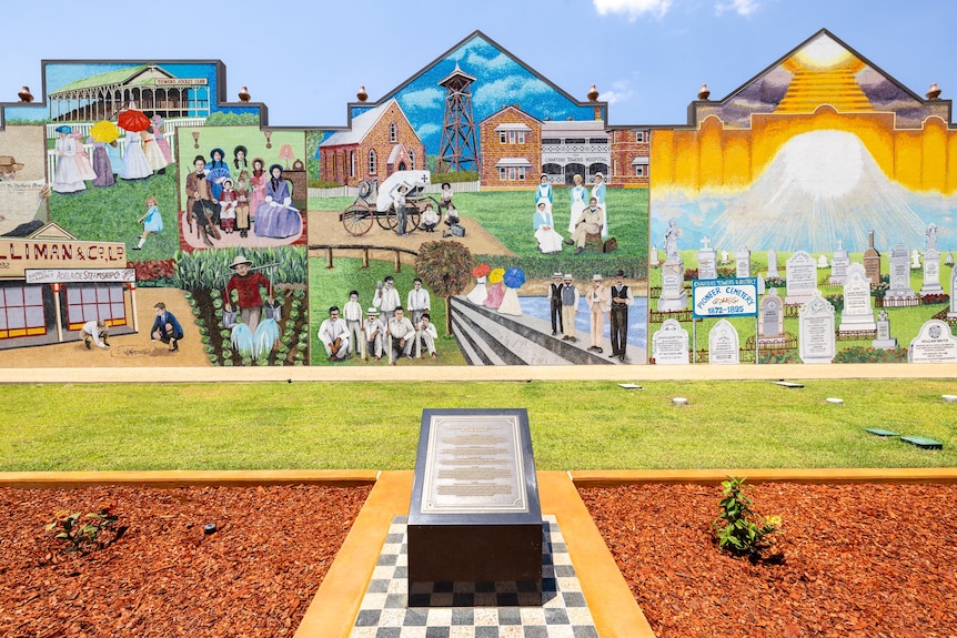 A colourful mosaic mural depicting historical scenes
