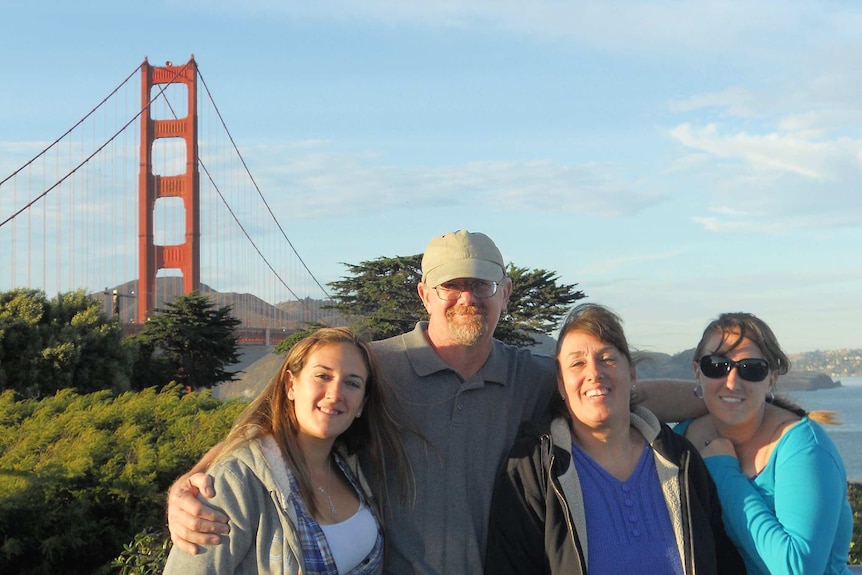 Damian Meins with his family.