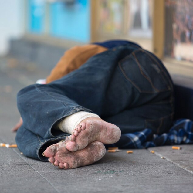 A homeless person sleeps on Fitzroy Street in St Kilda, November 19, 2018.
