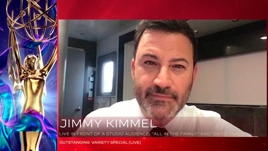Jimmy Kimmel appears virtually on a screen