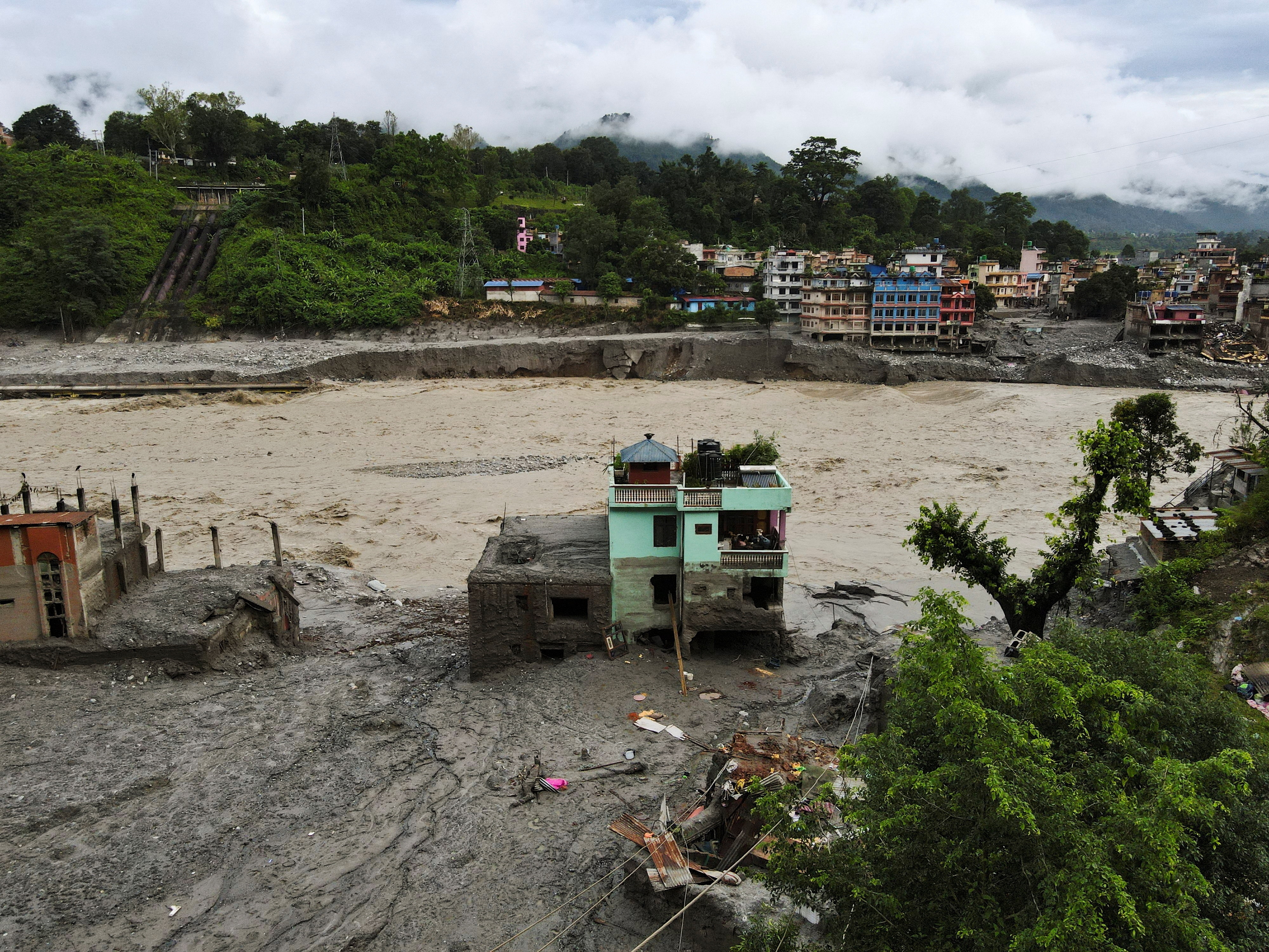 The turquoise home that withstood a torrent