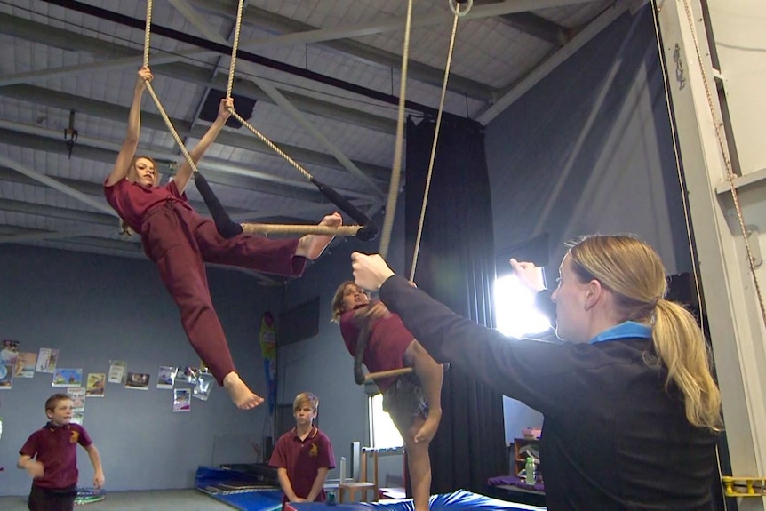 The classes are supervised by trained circus performers
