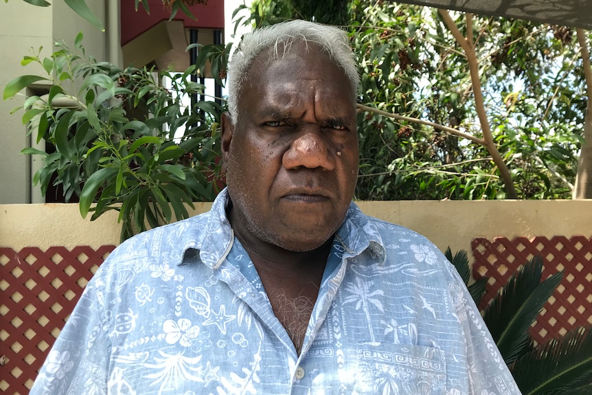 Tony Wurramarrba sitting and with a serious look on his face.