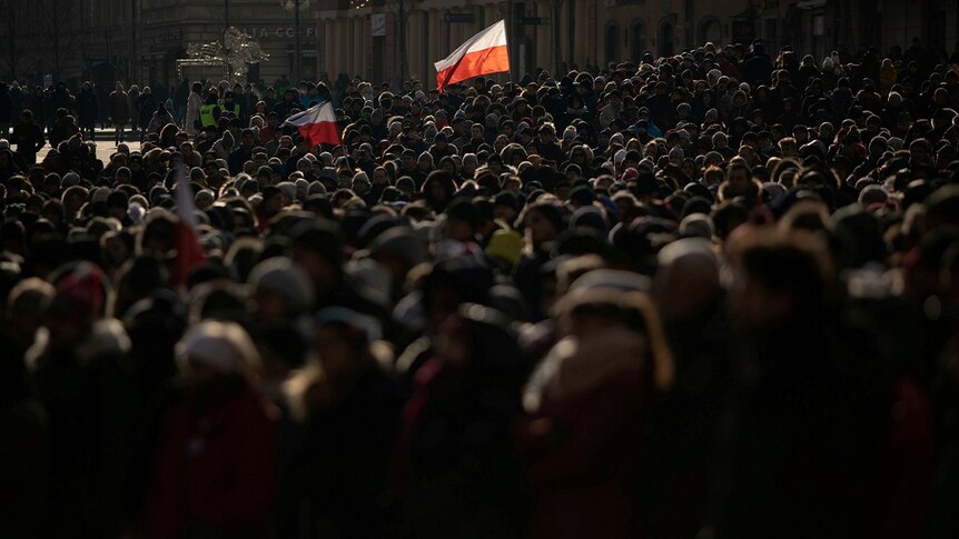 Crowds gathered to watch a broadcast of the funeral service for Gdansk's Mayor Pawel Adamowicz.