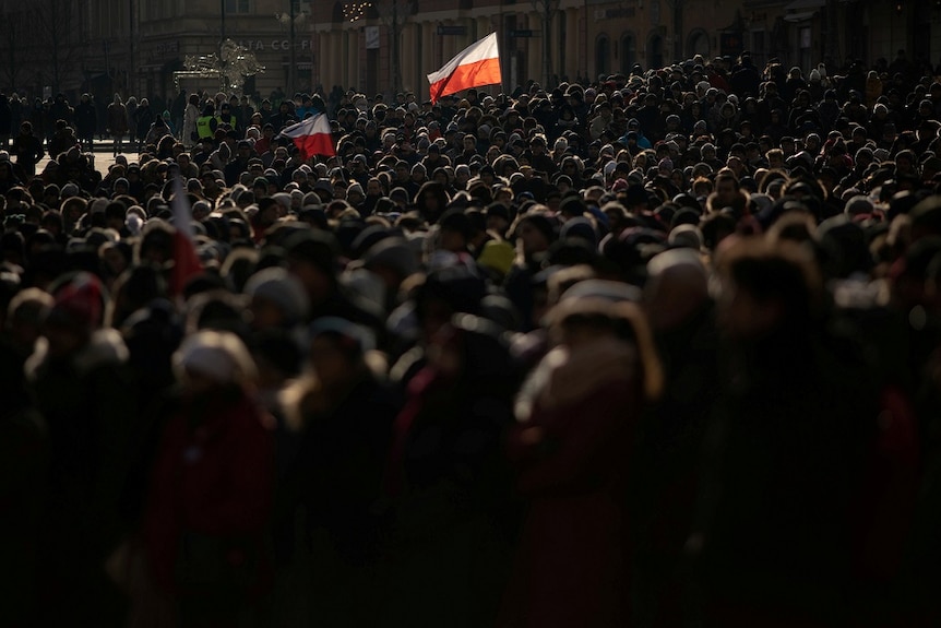 Crowds gathered to watch a broadcast of the funeral service for Gdansk's Mayor Pawel Adamowicz.